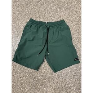 Green Volcom board shorts
